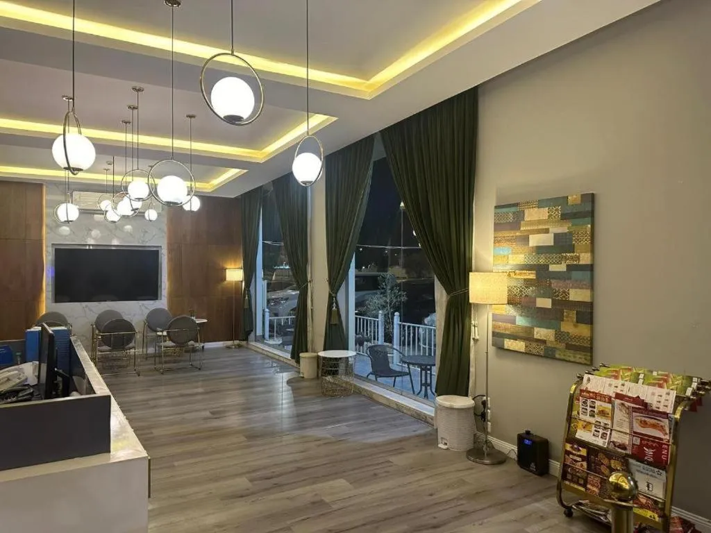 Image 1 of شقق نزل النخيل الفندقية
